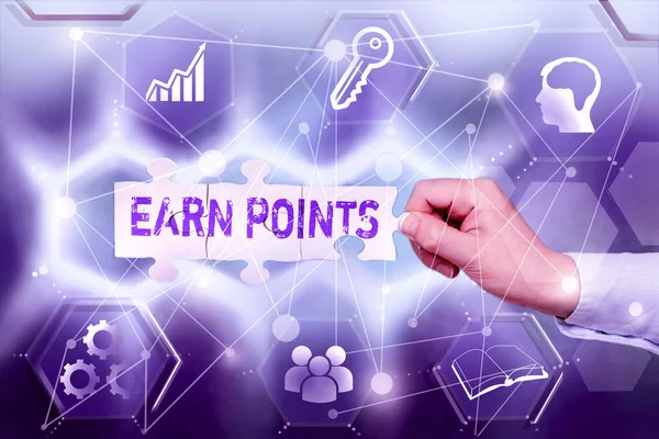 Inspiration showing sign Earn Points. Business showcase getting praise or approval for something you have done Hand Holding Jigsaw Puzzle Piece Unlocking New Futuristic Technologies. — Stock Photo, Image