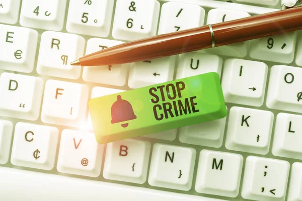 Inspiration showing sign Stop Crime. Business showcase the effort or attempt to reduce and deter crime and criminals Compiling And Typing Online Research Materials, Sending Chat Messages — Stock Photo, Image