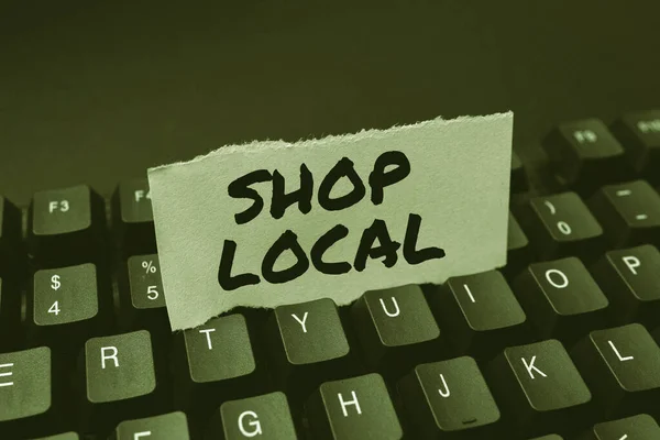 Написання тексту Shop Local. Бізнес-ідея віддає перевагу покупці місцевих товарів і послуг Створення нового інтернет-магазину бізнесу, введення списку торгових товарів — стокове фото