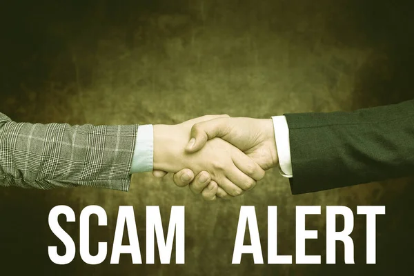 Text sign showing Scam Alert. Conceptual photo fraudulently obtain money from victim by persuading him Two Professional Well-Dressed Corporate Businessmen Handshake Indoors — Stock Photo, Image