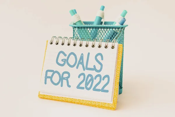 Writing displaying text Goals For 2022. Business concept object of persons ambition or effort aim or desired result Tidy Workspace Setup Writing Desk Tools And Equipment Taking Notes — Stock Photo, Image