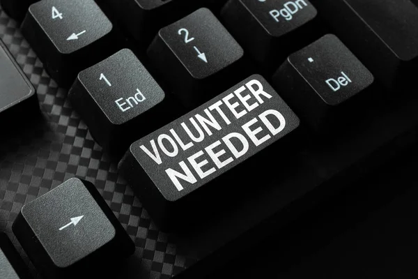 Sign displaying Volunteer Needed. Concept meaning asking person to work for organization without being paid Typing New Blog Contents, Writing Movie Scripts, Creating Computer Codes