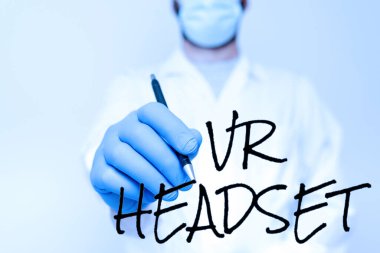 El yazısı levhası Vr Kulaklık. Yeni Teknolojiyi Giyen Bilimadamı 'na Doktor Danışmanlık Yapan Bilim Adamı' na sanal gerçeklik sağlayan iş konsepti.