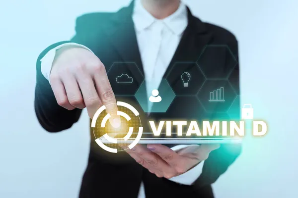 Bildunterschrift: Präsentation von Vitamin D. Geschäftsidee Nährstoff, der für die Steigerung der Darmresorption verantwortlich ist Lady In Suit Pointing On Tablet Zeigt futuristische grafische Oberfläche. — Stockfoto
