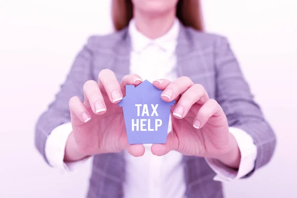 Conceptual display Tax Help. Business idea Assistance from the compulsory contribution to the state revenue A Young Lady Businesswoman Holding Presenting Home In Business Outfit — Stock Photo, Image