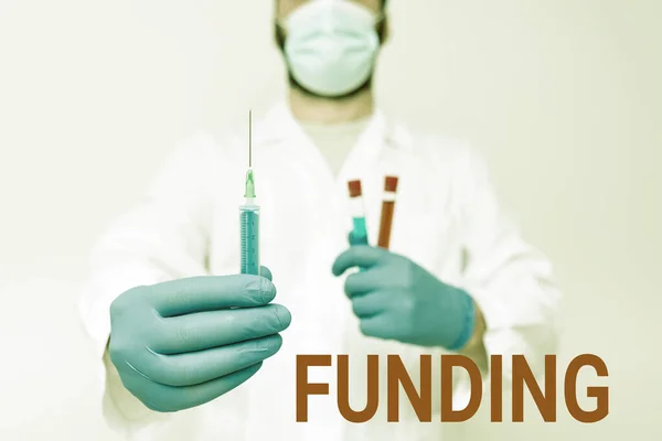 Writing displaying text Funding. Business showcase money provided by an organization or government for a purpose Chemist Explains Vaccination Program, Virus Prevention Procedures — Stock Photo, Image