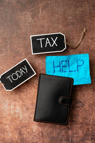 Writing displaying text Tax Help. Conceptual photo Assistance from the compulsory contribution to the state revenue Wooden Desktable With Smartphone Leather Wallet Eyeglasses And Notepad — Stock Photo, Image