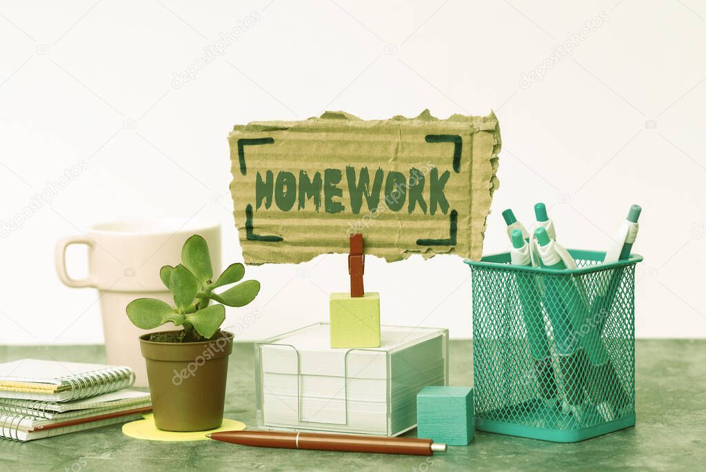 Conceptual caption Homework. Word for schoolwork assigned to be done outside the classroom or at home Tidy Workspace Setup Writing Desk Tools And Equipment Displaying Message