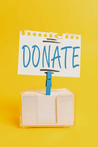 Writing displaying text Donate. Concept meaning give money or goods for good cause for example to charity or showing Colorful Idea Presentation Displaying Fresh Thoughts Sending Message