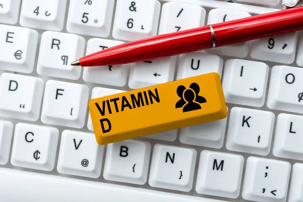 Text bildtext presenterar D-vitamin Affärsidé Näringsämne ansvarig för att öka intestinal absorption Skrivmaskin programkoder, Programmering nya spelbara program — Stockfoto