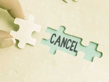 El yazısını iptal et. Planlanan etkinliğin yapılmayacağına karar vermek ya da duyurmak iş fikri. Tamamlanmamış beyaz testere desenli ve kayıp parçalı bir bulmaca oluşturulmayacak.