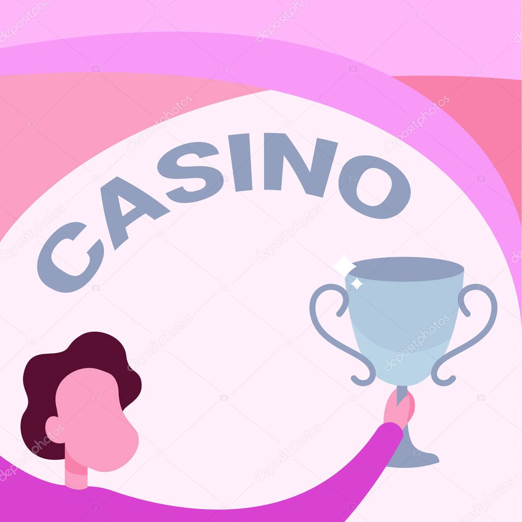 Text sign showing Casino. Conceptual photo a building where games especially roulette and card games are played Man Holding Trophy Cup Up High Celebrating Victory Achievement.