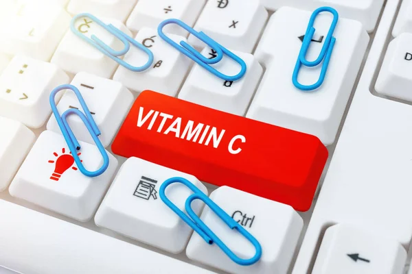 Textzeichen mit Vitamin C. Internet-Konzept fördert die Heilung und hilft dem Körper, Eisen Ascorbinsäure zu absorbieren Eingabe Produkttitel und Beschreibungen, Eingabe wichtiger Datencodes — Stockfoto