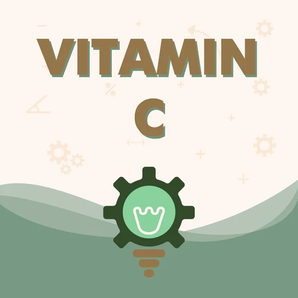 Teksttekst som presenterer Vitamin C. Concept som betyr at det fremmer tilheling og hjelper kroppen med å absorbere jern-askorbinsyre Illuminated Light Bulb With Gear Shell Showing Technology. – stockfoto