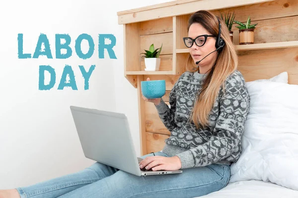 Hand writing sign Labor Day. Business idea an annual holiday to celebrate the achievements of workers Student Learning New Things Online, Casual Internet Surfing And Browsing