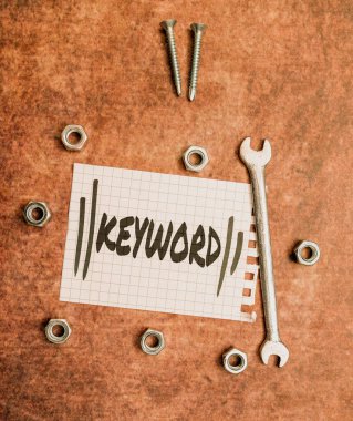 El yazısı işareti. Anahtar kelime. Çok önemli bir kod kavramının anahtarı görevi gören iş konsepti kelime Bakım Planlama Yaratıcı Düşünce için Yeni Fikirler