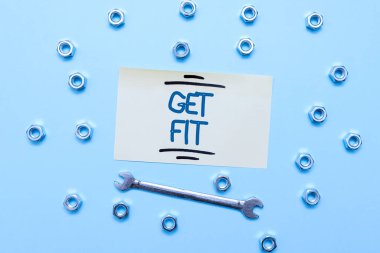 Get Fit 'i sunan metin başlığı. İnternet Biri veya bir şey için doğru boyut veya şekil kavramı Vücudunuzu sağlıklı tutun Bakım araçları ve Ekipman Mekanik ve Mühendis Tamirleri