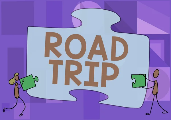 Text sign showing Road Trip. Business showcase long distance journey on the road traveled by automobile Colleagues Drawing Fitting Two Pieces Of Jigsaw Puzzle Together Teamwork.