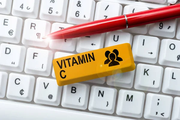 Текстовый знак, показывающий витамин С. Концепция, означающая, что он способствует заживлению и помогает организму поглощать железо Аскорбиновая кислота — стоковое фото