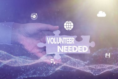 Gönüllüye ihtiyaç olduğunu gösteren mesaj işareti. Kavram, insanlardan el ele tutuşan yapboz parçasının kilidini açmadan organizasyon için çalışmalarını istemektir..