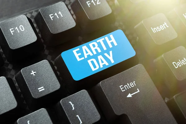 Writing displaying text Earth Day. Business idea Worldwide celebration of ecology environment preservation Compiling And Typing Online Research Materials, Sending Chat Messages — Stock Photo, Image