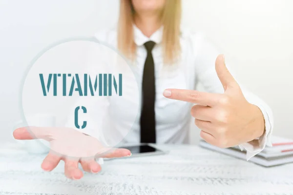 Vitamin C. Conceptual photo it promoterer healing og hjelper kroppen å absorbere jern askorbinsyre App Developer Presenter nytt program, viser oppgradert utstyr – stockfoto