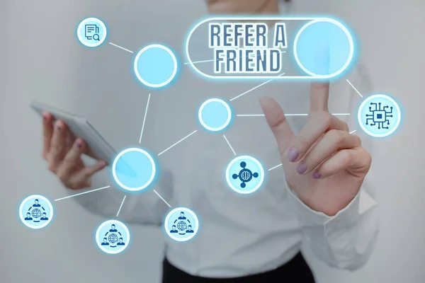 Hand writing sign Refer A Friend. Business approach direct someone to another or send him something like gift Lady Holding Tablet Pressing On Virtual Button Showing Futuristic Tech. — Stock Photo, Image