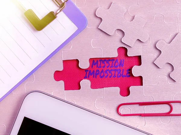 Text sign showing Mission Impossible. Business concept Difficult Dangerous Assignment Isolated Unimaginable Task Building An Unfinished White Jigsaw Pattern Puzzle With Missing Last Piece — Stock Photo, Image