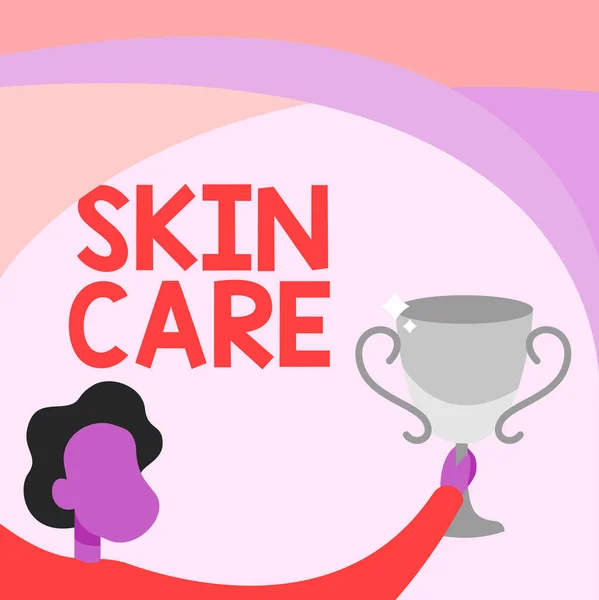 Text showing inspiration Skin Care. Business approach things that you do or use to keep your skin healthy and attractive Man Holding Trophy Cup Up High Celebrating Victory Achievement. — Stock Photo, Image