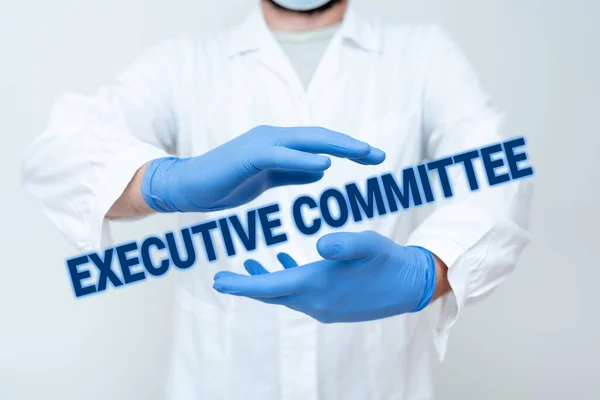Text sign showing Executive Committee. Word for Group of Directors appointed Has Authority in Decisions Scientist Demonstrating New Technology, Doctor Giving Medical Advice