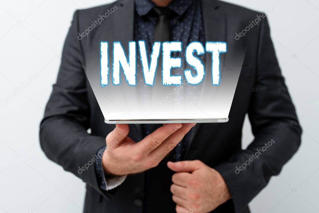 Sign displaying Invest. Word Written on commercial venture with the expectation of achieving a profit Presenting New Technology Ideas Discussing Technological Improvement
