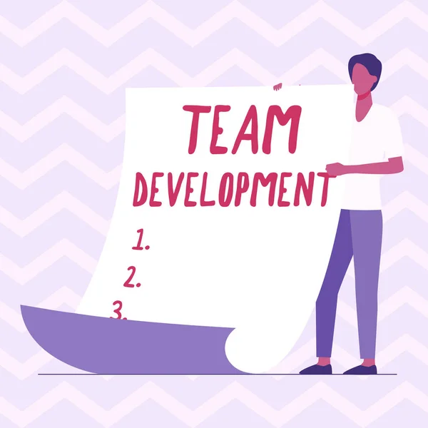 Text showing inspiration Team Development. Concept meaning learn why and how small groups change over time with graphs Man Standing Holding Large Blank Paper Showing New Meaning And Message. — Stock Photo, Image