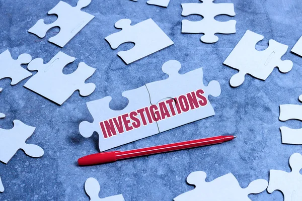 Text sign showing Investigations. Business approach The formal action or systematic examination about something Building An Unfinished White Jigsaw Pattern Puzzle With Missing Last Piece — Stock Photo, Image