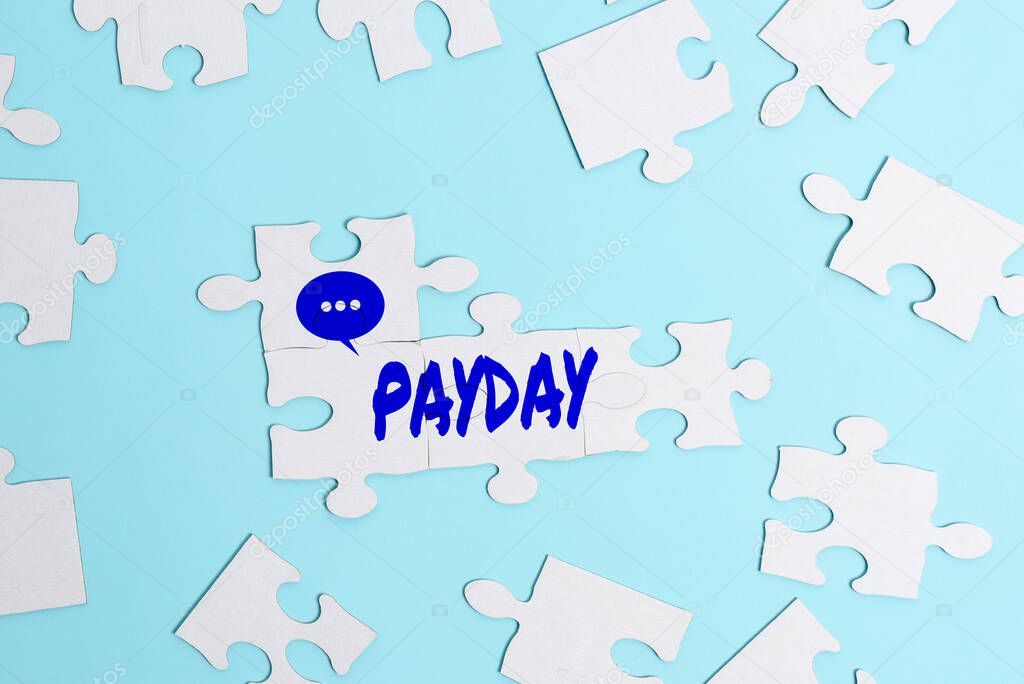 Hand writing sign Payday. Business overview a day on which someone is paid or expects to be paid their wages Building An Unfinished White Jigsaw Pattern Puzzle With Missing Last Piece