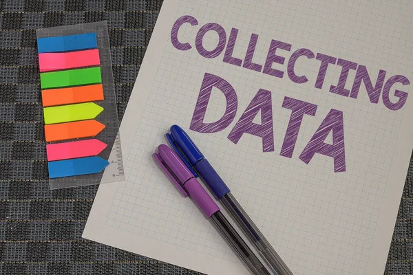 Writing displaying text Collecting Data. Business approach Gathering and measuring information on variables of interest Multiple Assorted Collection Office Stationery Photo Placed Over Table — Stock Photo, Image