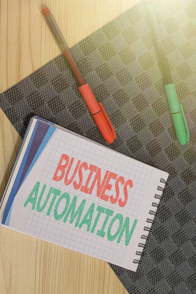 Schilder mit der Aufschrift Business Automation. Konzept für digitale Transformation vereinfacht für Einfachheit Multiple Assorted Collection Office Stationery Foto über Tisch gelegt — Stockfoto