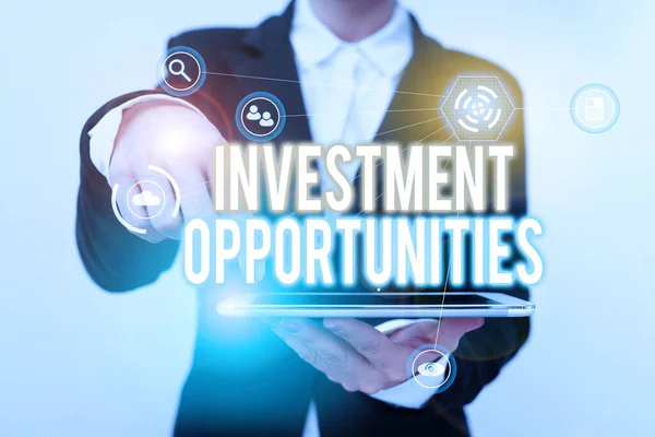 Writing displaying text Investment Opportunities. Internet Concept a Purchase that has a chance to Gain Value Lady In Suit Pointing On Tablet Showing Futuristic Graphic Interface. — Stock Photo, Image