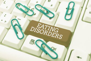 Yemek yeme bozukluklarını gösteren bir tabela. Psikolojik anormal yemek alışkanlıkları için kelime. Yazım Üretimi, Soyut Sunum Geliştirilmiş Klavye