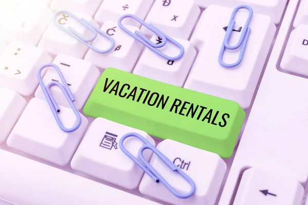 Writing displaying text Vacation Rentals. Business approach Renting out of apartment house condominium for a short stay Typing Difficult Program Codes, Writing New Educational Book — Stock Photo, Image