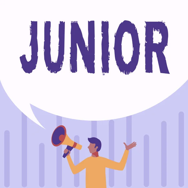 Handwriting text Junior. Word Written on erson who is a specified number of years younger than someone else Man Drawing Holding Megaphone With Big Speech Bubble Showing Message. — Stock Photo, Image