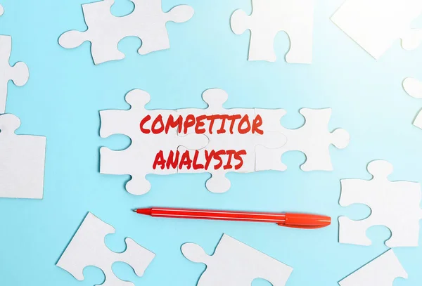 Text showing inspiration Competitor Analysis. Business concept Determine the Strength Weakness of Competitive Market Building An Unfinished White Jigsaw Pattern Puzzle With Missing Last Piece — Stock Photo, Image