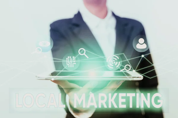Writing displaying text Local Marketing. Business concept A local business where a product buy and sell in area base Lady In Suit Presenting Mobile Device With Futuristic Interface Tech. — Stock Photo, Image