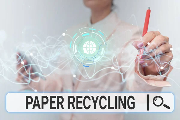 Conceptual caption Paper Recycling. Business concept Using the waste papers in a new way by recycling them Lady In Uniform Using Futuristic Mobile Holographic Display Screen. — Stock Photo, Image
