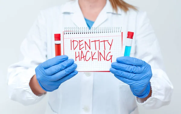 Writing displaying text Identity Hacking. Business showcase criminal that steal your personal information using malware Testing Medicine And Vaccine For Virus Infection Laboratory Trial Tests