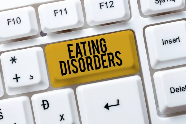 İlham veren yemek yeme bozukluklarını gösteren bir metin. İş konsepti: İlginç Çevrimiçi Konular, Daktilo Ofisi Bildirimleri Yazan Psikolojik Anormal Yemek Alışkanlıkları