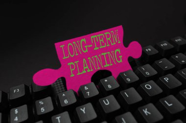 El yazısı uzun dönem planlama. Beklenen Hedefleri Belirlemek, Çevrimiçi Daktilo Servisleri Oluşturmak, Bilgisayar Kodları Öğrenmek İçin Beş ya da daha fazla yıl Önce İş Konsepti