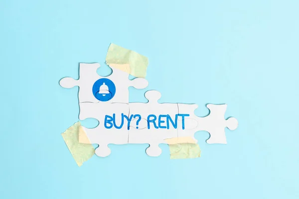 Hand writing sign Buy Question Rent. Internet Concept Group that gives information about renting houses Building An Unfinished White Jigsaw Pattern Puzzle With Missing Last Piece — Stock Photo, Image