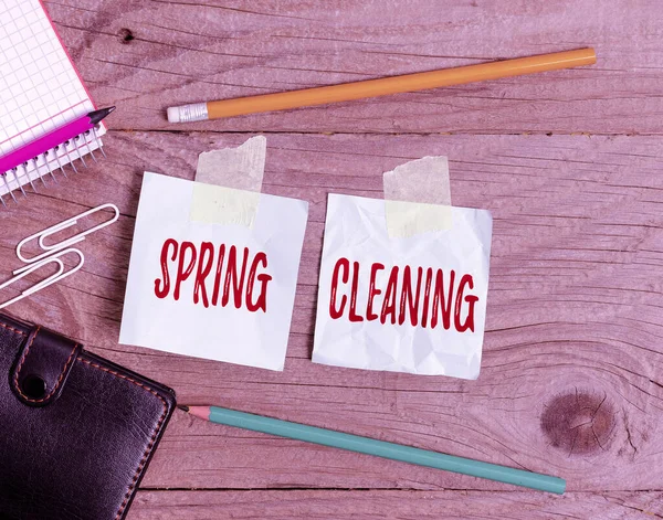 Sign displaying Spring Cleaning. Concept meaning practice of thoroughly cleaning house in the springtime Display of Different Color Sticker Notes Arranged On flatlay Lay Background — Stock Photo, Image