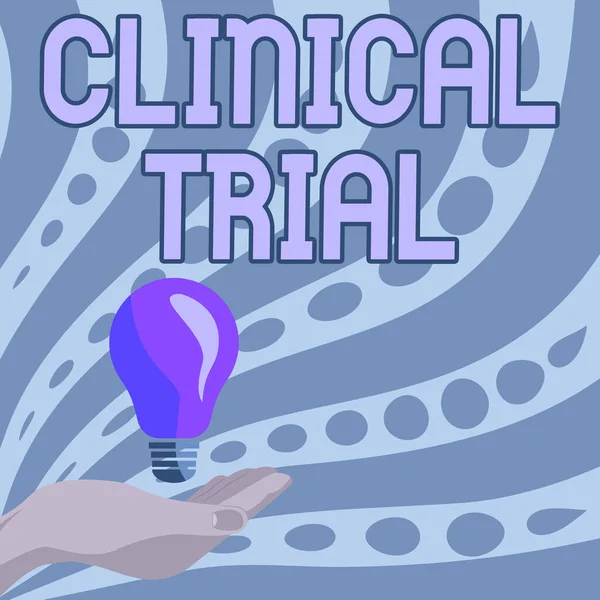 Text sign showing Clinical Trial. Word for evaluate the effectiveness and safety of medications Lady Hands Holding Lamp With Formal Outfit Presenting New Ideas For Project, — Stock Photo, Image