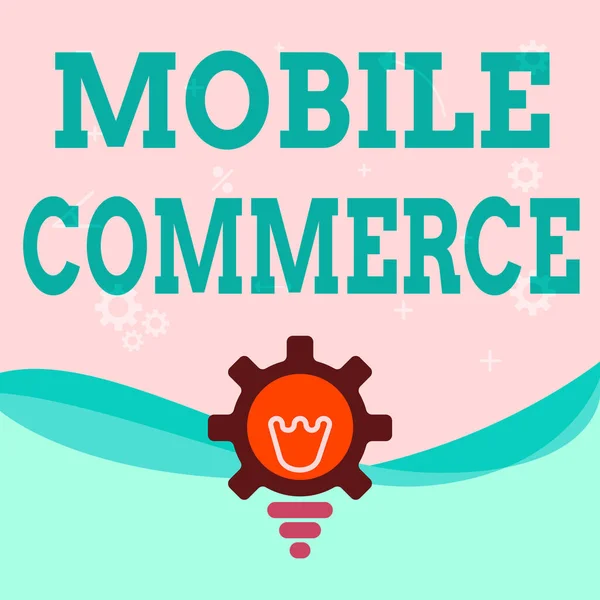 Text showing inspiration Mobile Commerce. Business overview Using mobile phone to conduct commercial transactions online Illuminated Light Bulb With Gear Shell Showing Technology Ideas. — 图库照片
